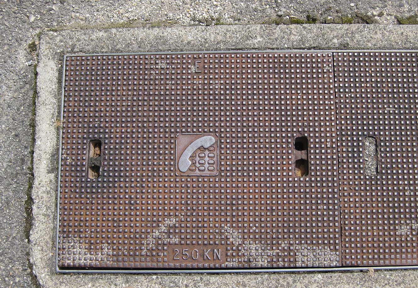 an access panel in the road