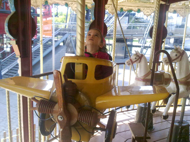 granddaughter on carousel